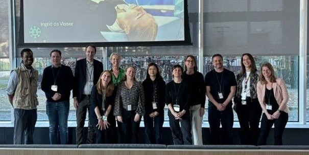 Photograph of MUSICC and CEPI teams stood together facing the camera.