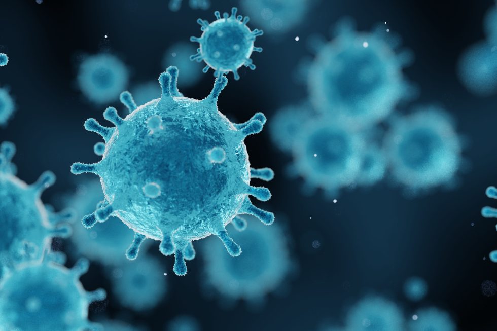Designed image of microscopic view of several COVID-19 type viruses.