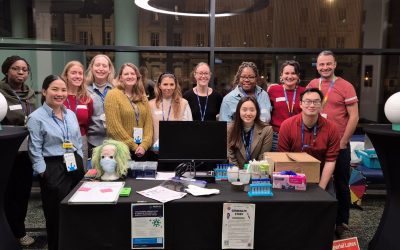 The MUSICC team at the Would You Get Sick for Science stand.