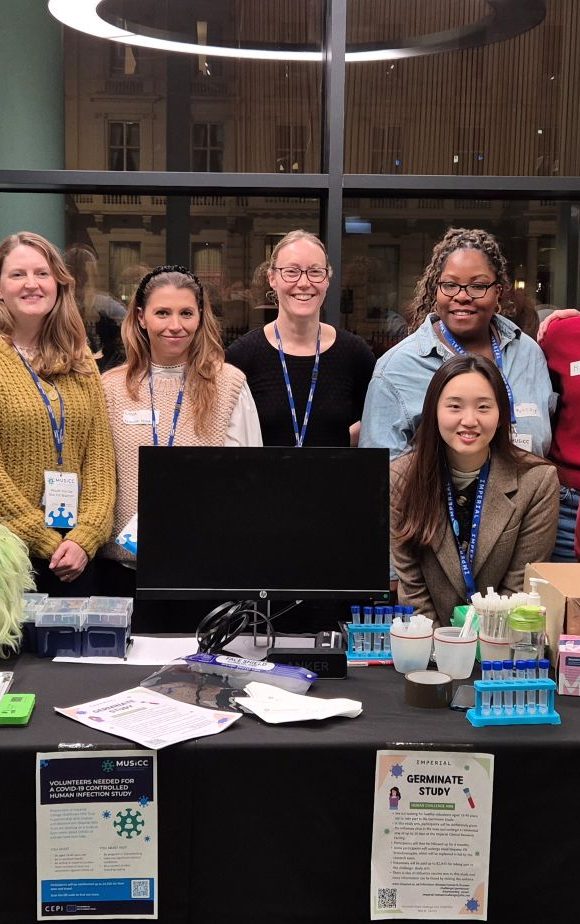 The MUSICC team at the Would You Get Sick for Science stand.